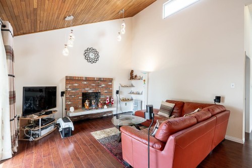 6496 Quebec Street, Vancouver, BC - Indoor Photo Showing Living Room With Fireplace
