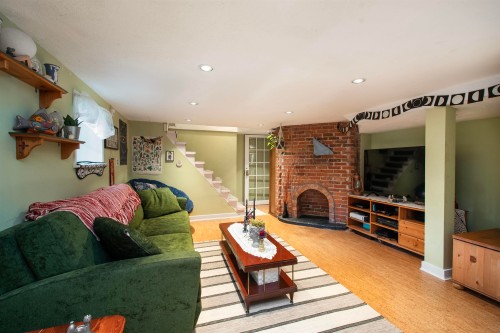 1560 Macgowan Avenue, North Vancouver, BC - Indoor Photo Showing Living Room With Fireplace