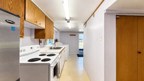 4458 Skeena Street, Vancouver, BC - Indoor Photo Showing Kitchen With Double Sink