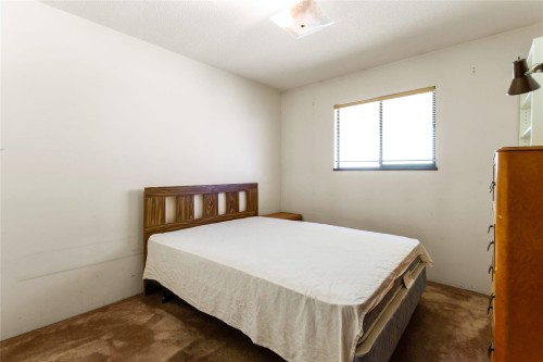 2986 3Rd Avenue E, Vancouver, BC - Indoor Photo Showing Bedroom