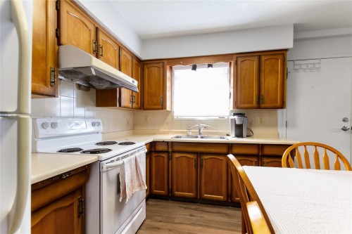 2986 3Rd Avenue E, Vancouver, BC - Indoor Photo Showing Kitchen With Double Sink