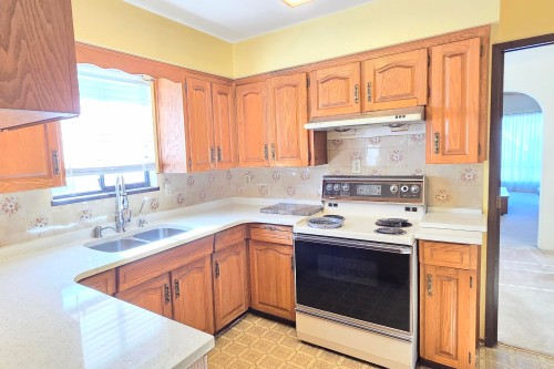 2986 3Rd Avenue E, Vancouver, BC - Indoor Photo Showing Kitchen With Double Sink