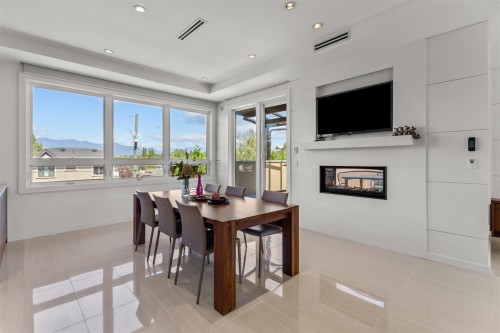 2507 Edgar Crescent, Vancouver, BC - Indoor Photo Showing Dining Room With Fireplace