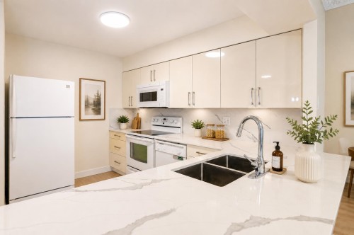 603-2468 Broadway E, Vancouver, BC - Indoor Photo Showing Kitchen With Double Sink