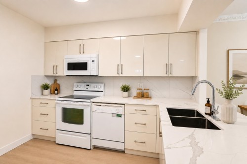 603-2468 Broadway E, Vancouver, BC - Indoor Photo Showing Kitchen With Double Sink