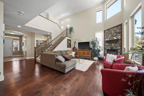 24781 Mcclure Drive, Maple Ridge, BC - Indoor Photo Showing Living Room With Fireplace