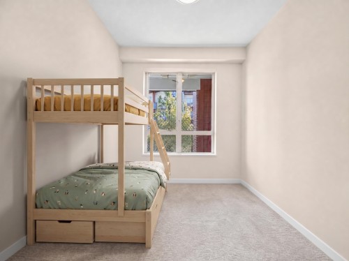204-2651 Library Lane, North Vancouver, BC - Indoor Photo Showing Bedroom