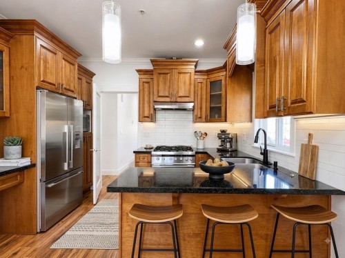 2388 5Th Avenue E, Vancouver, BC - Indoor Photo Showing Kitchen With Double Sink