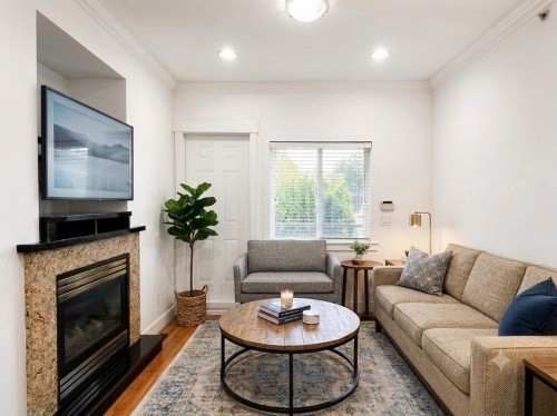 2388 5Th Avenue E, Vancouver, BC - Indoor Photo Showing Living Room With Fireplace