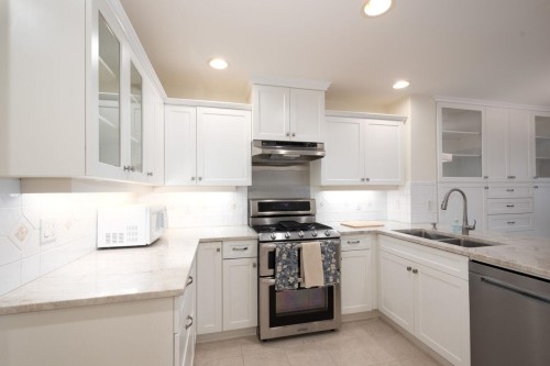 43 Point Terrace, West Vancouver, BC - Indoor Photo Showing Kitchen With Double Sink