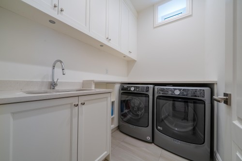 4627 15Th Avenue W, Vancouver, BC - Indoor Photo Showing Laundry Room