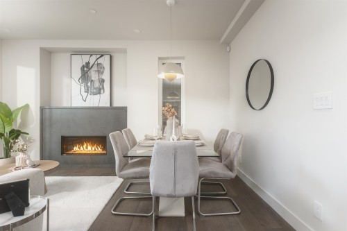 1-638 46Th Avenue E, Vancouver, BC - Indoor Photo Showing Dining Room With Fireplace