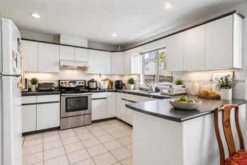 4491 Carter Drive, Richmond, BC - Indoor Photo Showing Kitchen With Double Sink