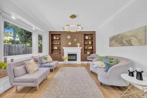 3491 40Th Avenue W, Vancouver, BC - Indoor Photo Showing Living Room With Fireplace