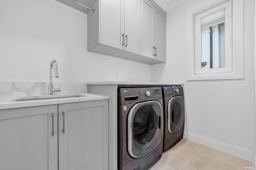 3491 40Th Avenue W, Vancouver, BC - Indoor Photo Showing Laundry Room