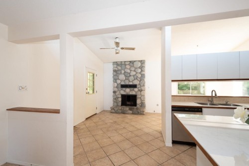 1241 Nepal Crescent, West Vancouver, BC - Indoor Photo Showing Kitchen With Fireplace With Double Sink