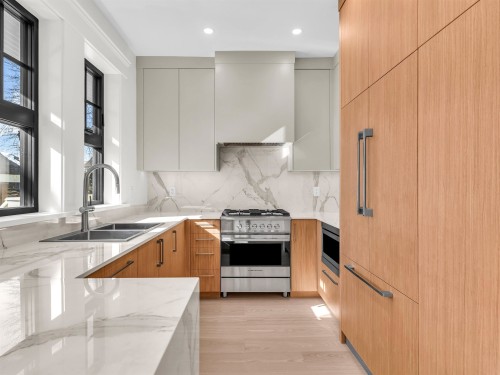 2566 2Nd Avenue W, Vancouver, BC - Indoor Photo Showing Kitchen With Double Sink With Upgraded Kitchen