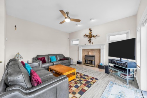 2381 40Th Avenue E, Vancouver, BC - Indoor Photo Showing Living Room With Fireplace