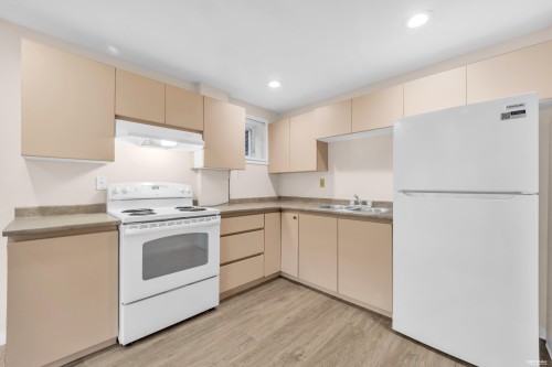 2381 40Th Avenue E, Vancouver, BC - Indoor Photo Showing Kitchen With Double Sink