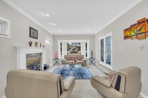 2381 40Th Avenue E, Vancouver, BC - Indoor Photo Showing Living Room With Fireplace