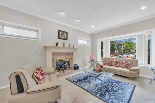 2381 40Th Avenue E, Vancouver, BC - Indoor Photo Showing Living Room With Fireplace