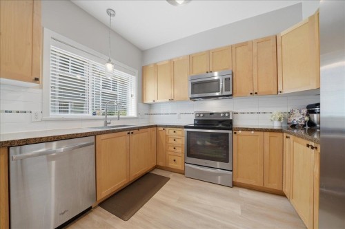 19-621 Langside Avenue, Coquitlam, BC - Indoor Photo Showing Kitchen With Stainless Steel Kitchen