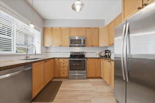 19-621 Langside Avenue, Coquitlam, BC - Indoor Photo Showing Kitchen With Stainless Steel Kitchen