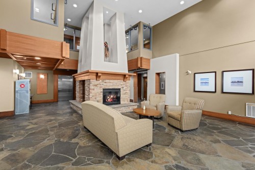 408-560 Ravenwoods Drive, North Vancouver, BC - Indoor With Fireplace