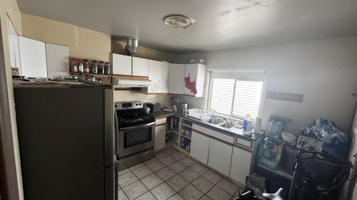 75 Nanaimo Street N, Vancouver, BC - Indoor Photo Showing Kitchen With Double Sink
