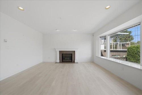 6212 Vivian Street, Vancouver, BC - Indoor Photo Showing Living Room With Fireplace