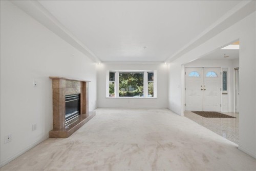 6212 Vivian Street, Vancouver, BC - Indoor Photo Showing Other Room With Fireplace