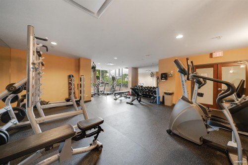 501-295 Guildford Way, Port Moody, BC - Indoor Photo Showing Gym Room
