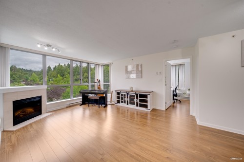 501-295 Guildford Way, Port Moody, BC - Indoor Photo Showing Living Room With Fireplace