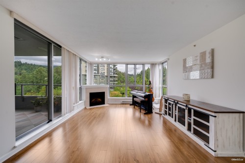 501-295 Guildford Way, Port Moody, BC - Indoor Photo Showing Other Room With Fireplace