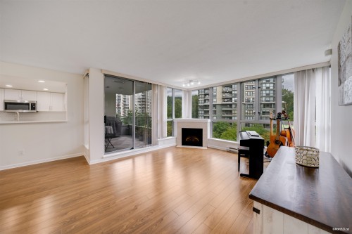 501-295 Guildford Way, Port Moody, BC - Indoor Photo Showing Living Room With Fireplace