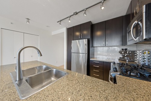 1603-651 Nootka Way, Port Moody, BC - Indoor Photo Showing Kitchen With Stainless Steel Kitchen With Double Sink With Upgraded Kitchen