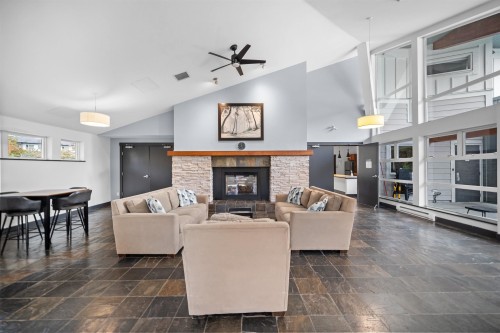 1603-651 Nootka Way, Port Moody, BC - Indoor Photo Showing Living Room With Fireplace