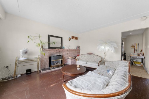 339 41St Avenue E, Vancouver, BC - Indoor Photo Showing Other Room With Fireplace