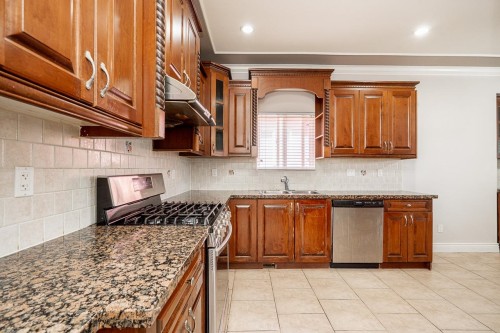 7202 Ross Street, Vancouver, BC - Indoor Photo Showing Kitchen With Double Sink