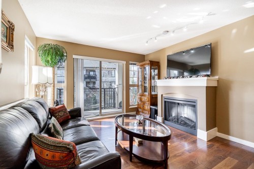 414-2958 Silver Spring Boulevard, Coquitlam, BC - Indoor Photo Showing Living Room With Fireplace