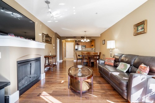 414-2958 Silver Spring Boulevard, Coquitlam, BC - Indoor Photo Showing Living Room With Fireplace