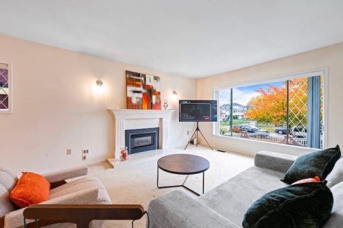 3136 53Rd Avenue E, Vancouver, BC - Indoor Photo Showing Living Room With Fireplace
