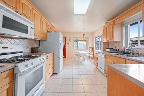 3136 53Rd Avenue E, Vancouver, BC - Indoor Photo Showing Kitchen With Double Sink