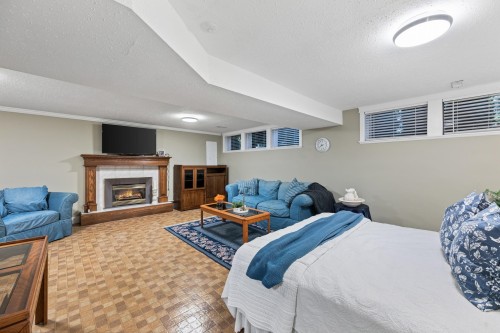 928 Merritt Street, Coquitlam, BC - Indoor Photo Showing Other Room With Fireplace