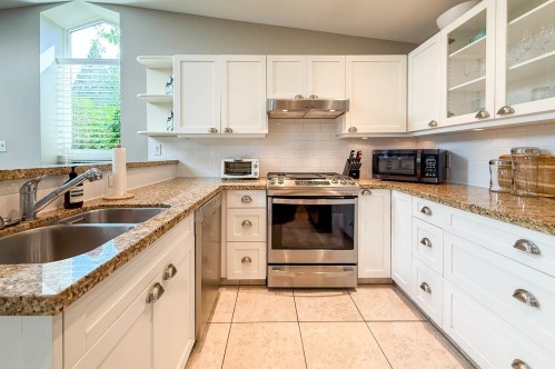 Withheld Withheld, North Vancouver, BC - Indoor Photo Showing Kitchen With Double Sink