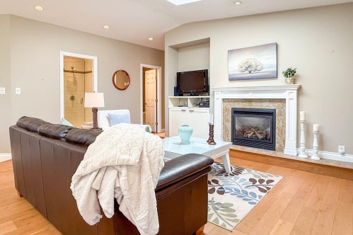Withheld Withheld, North Vancouver, BC - Indoor Photo Showing Living Room With Fireplace
