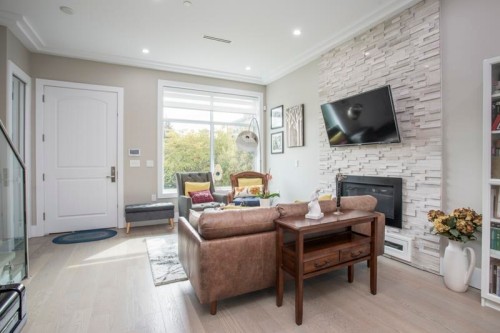 8559 Montcalm Street, Vancouver, BC - Indoor With Fireplace