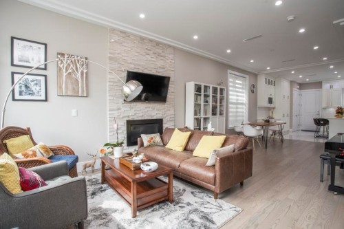 8559 Montcalm Street, Vancouver, BC - Indoor Photo Showing Living Room With Fireplace