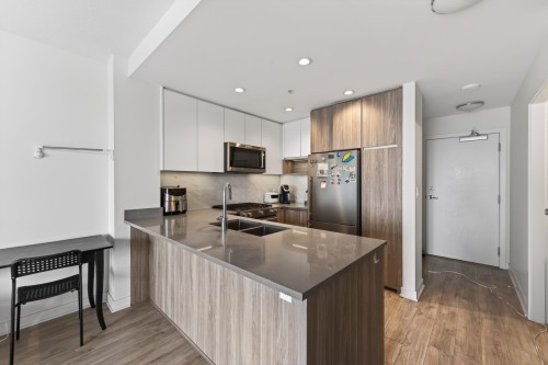 1103-8940 University Crescent, Burnaby, BC - Indoor Photo Showing Kitchen With Double Sink With Upgraded Kitchen