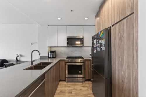 1103-8940 University Crescent, Burnaby, BC - Indoor Photo Showing Kitchen With Double Sink With Upgraded Kitchen